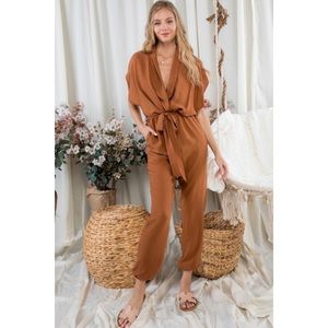 New! Jumpsuit burnt orange with belt